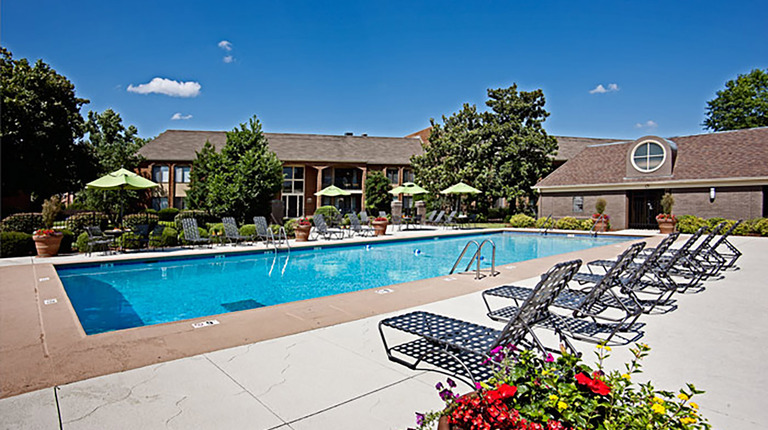 Resort-Inspired Pool with Sundeck and Lounge Seating