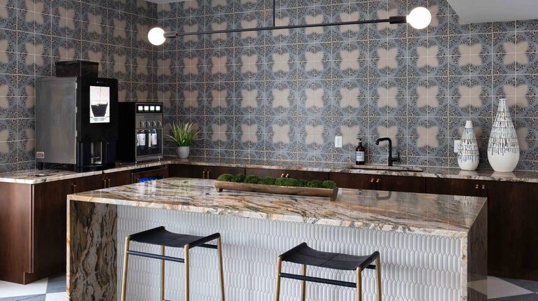 Resident lounge with gourmet coffee bar and wine station