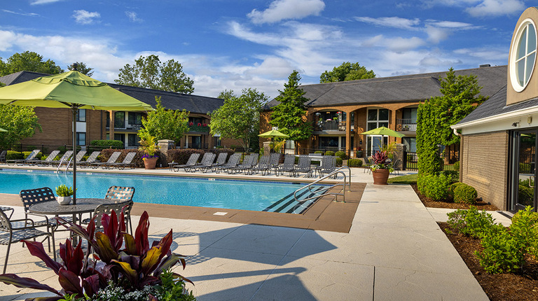 Resort-inspired pool with outdoor seating